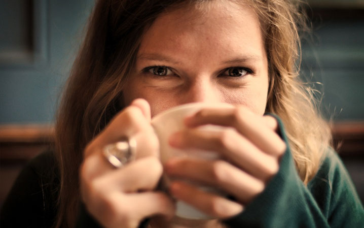 Woman cozy with cup